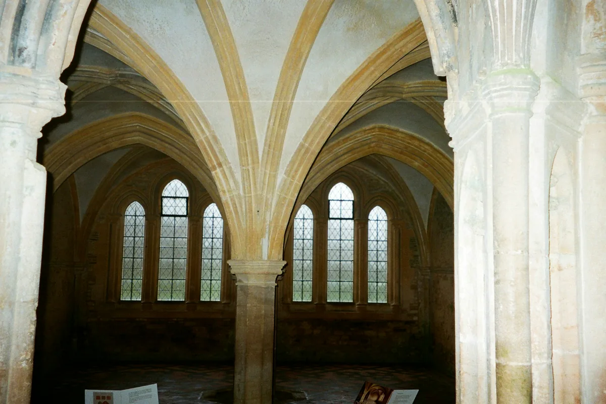 The vaulted stone interior of an old monastic building