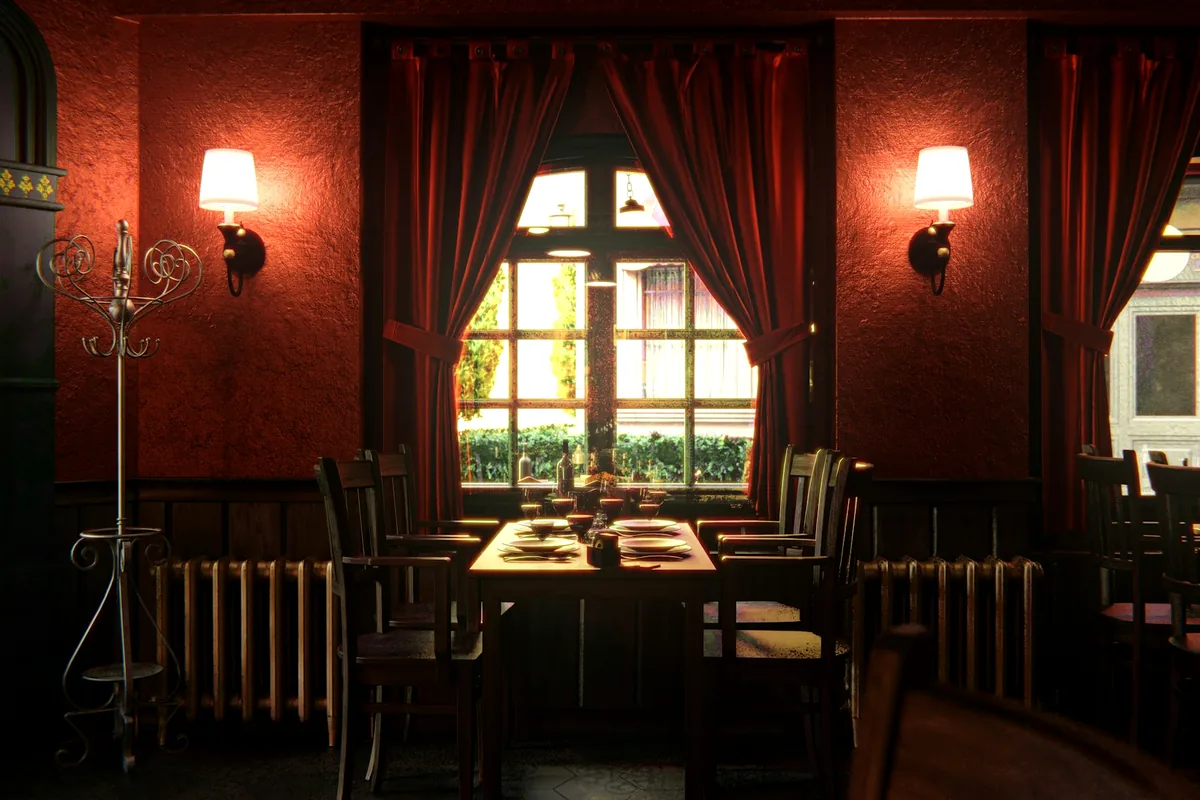A small dimly lit dining room with red walls and curtains