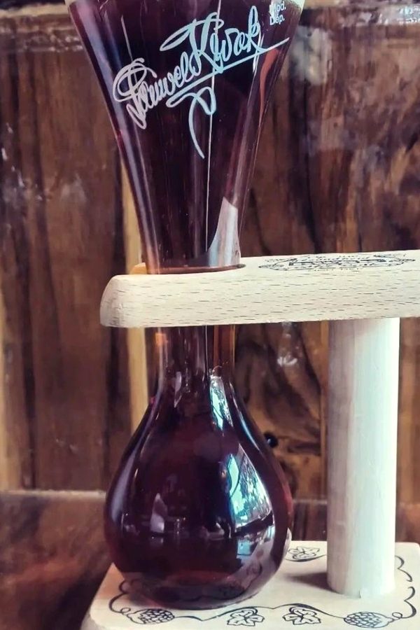 A Kwak beer in its wooden stand on the bar at Meyboom Brasserie