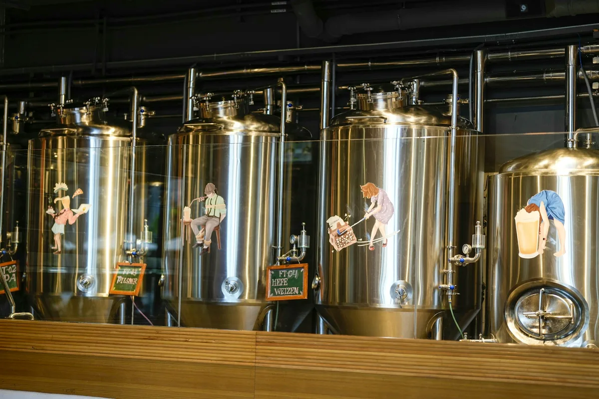Stainless steel fermentation tanks in a brewery