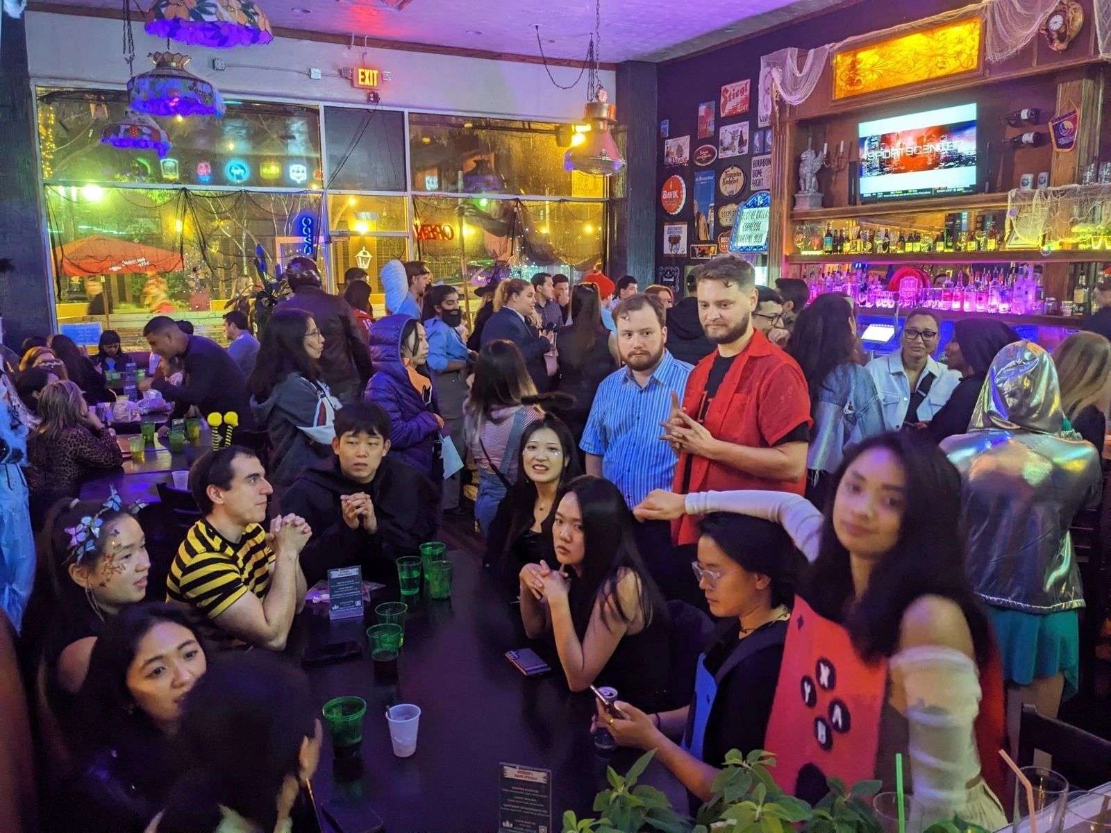 The bar room filled with guests during Halloween 2023 at Meyboom Brasserie