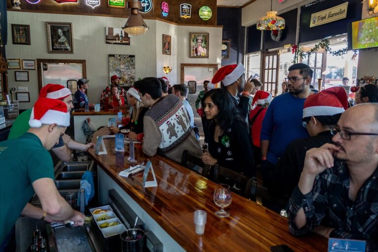 Guests at the Naughty or Nice 2023 holiday party at Meyboom Brasserie