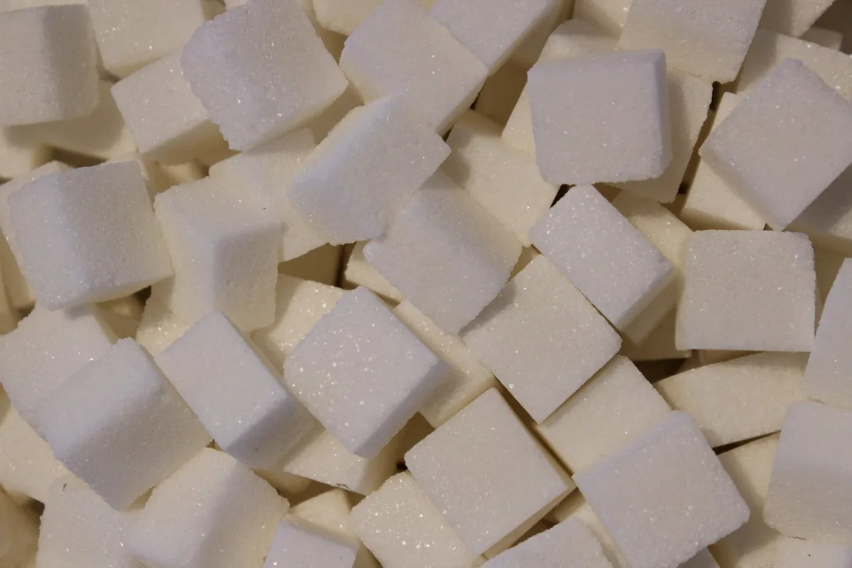 A pile of white sugar cubes